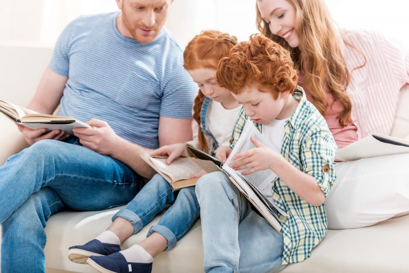 homeschooling family reading together