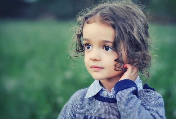young girl in a field